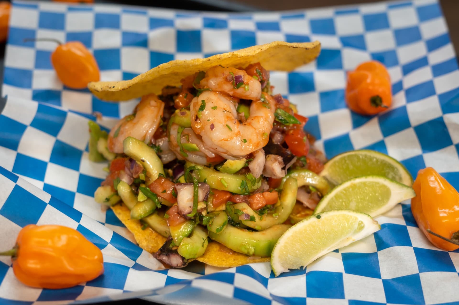 Fresh shrimp ceviche tostada with avocado, lime and habaneros