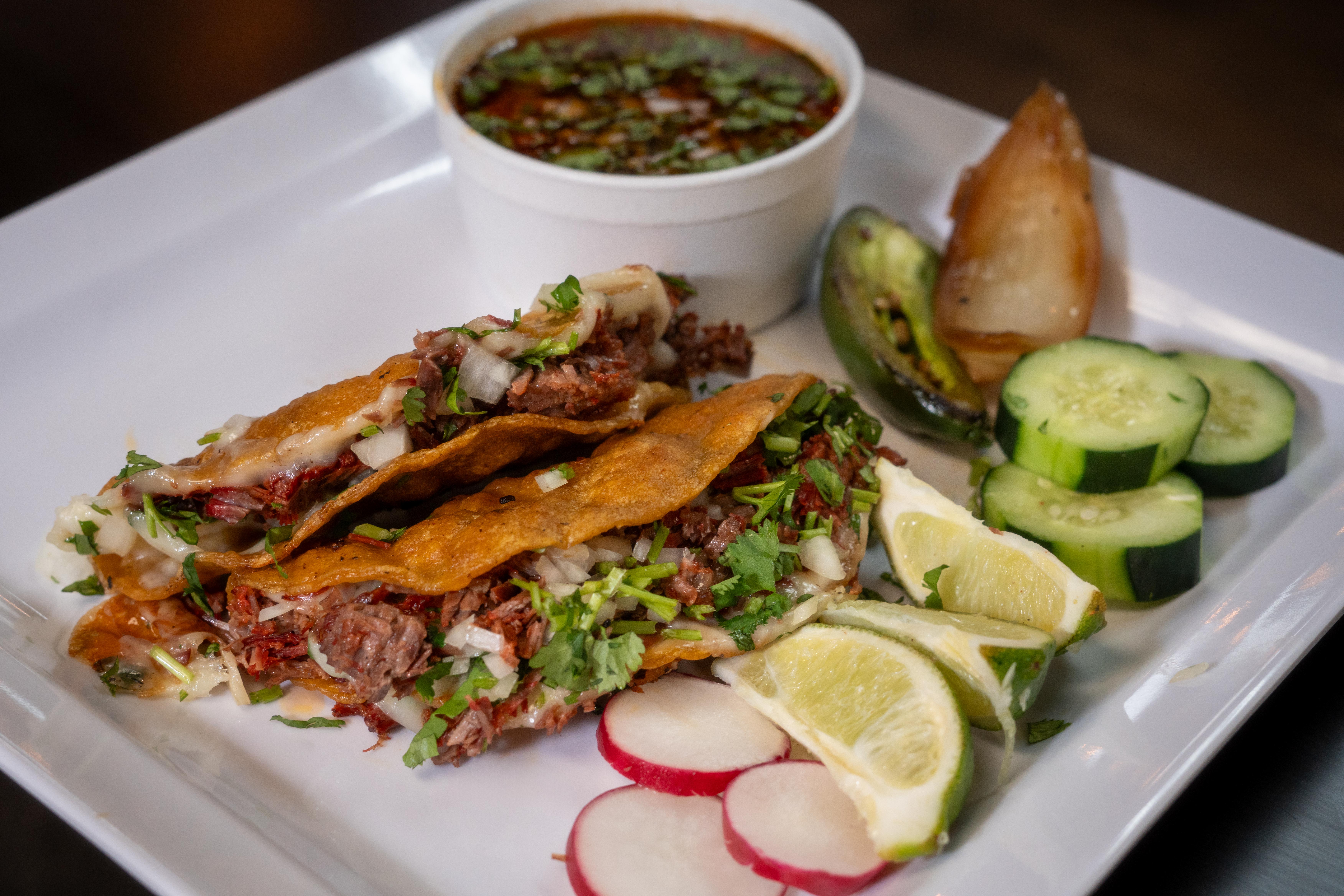 Birria Tacos with consommé
